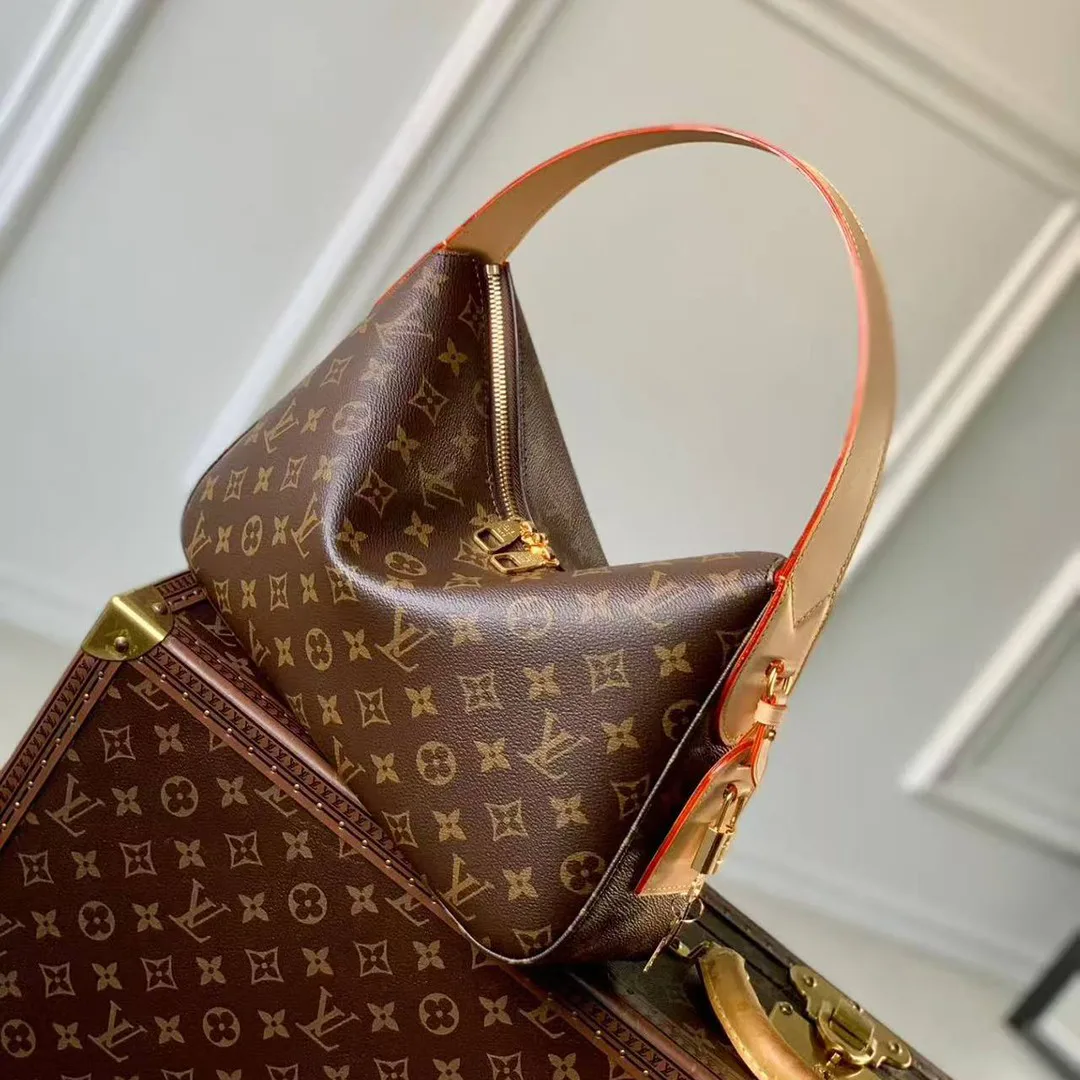 M11952 Slouchy PM Handbag Monogram Coated Canvas