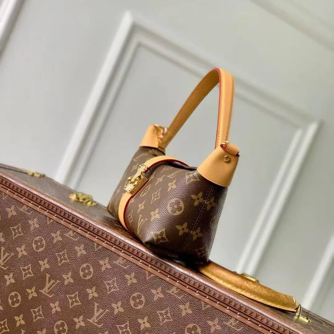 M26191 Pochette Mia Handbag Monogram Coated Canvas