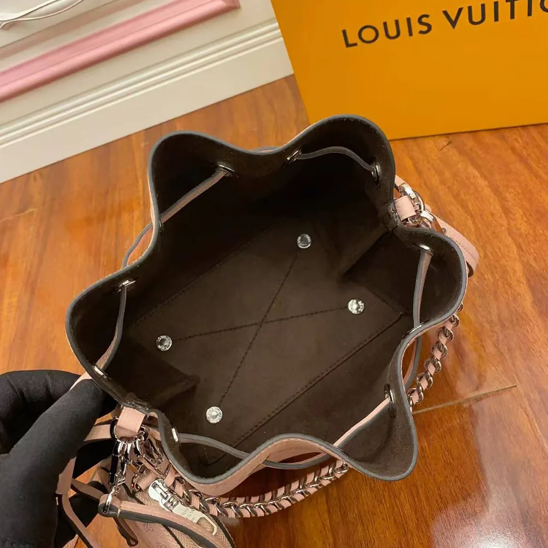 M23195 Bella Bucket Bag Handbag Monogram Mahina Perforated Calfskin Leather