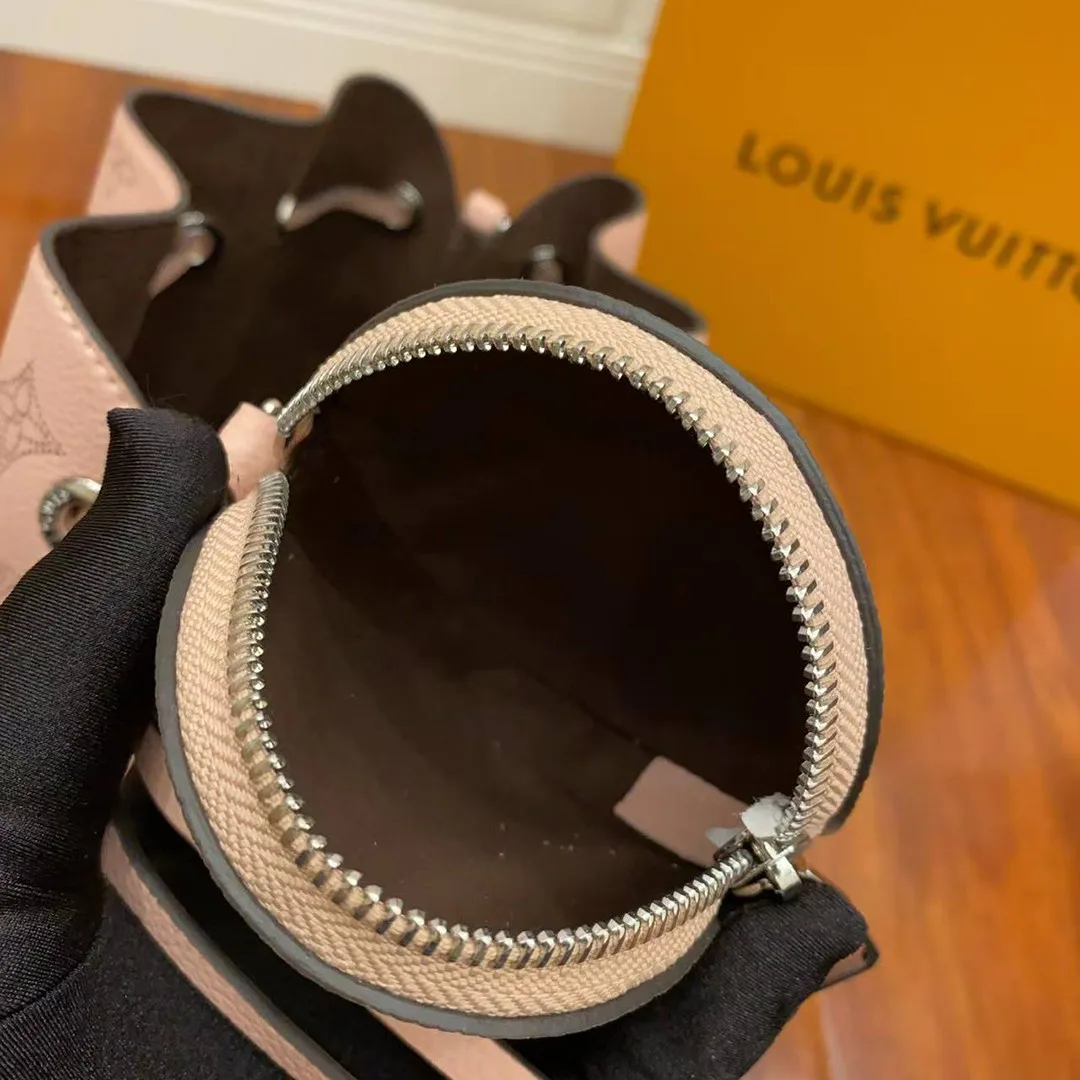 M23195 Bella Bucket Bag Handbag Monogram Mahina Perforated Calfskin Leather