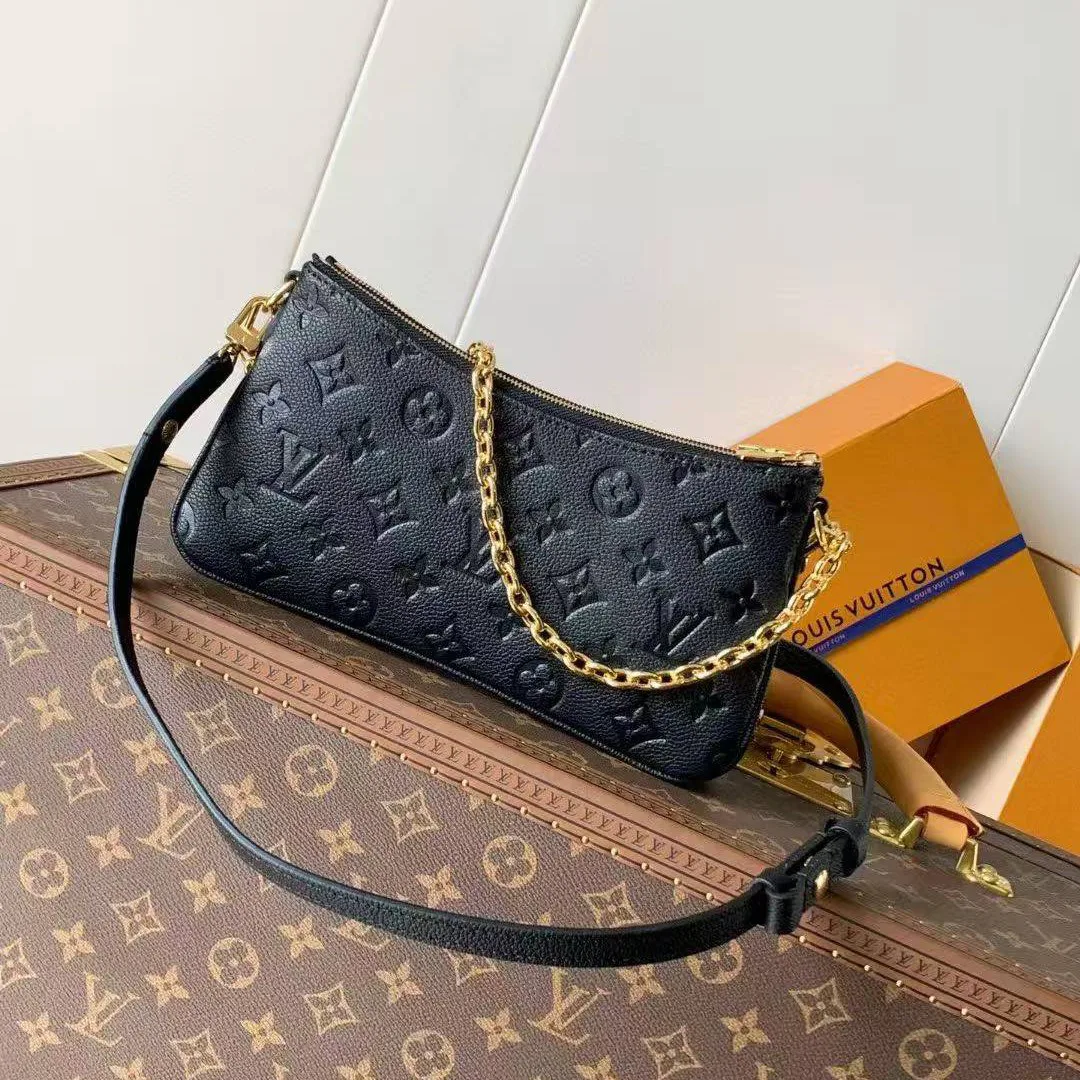 M83301 Pochette Liv Bag Monogram Empreinte Leather Handbag