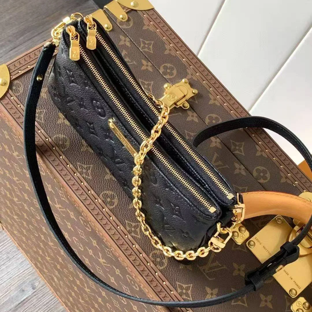 M83301 Pochette Liv Bag Monogram Empreinte Leather Handbag