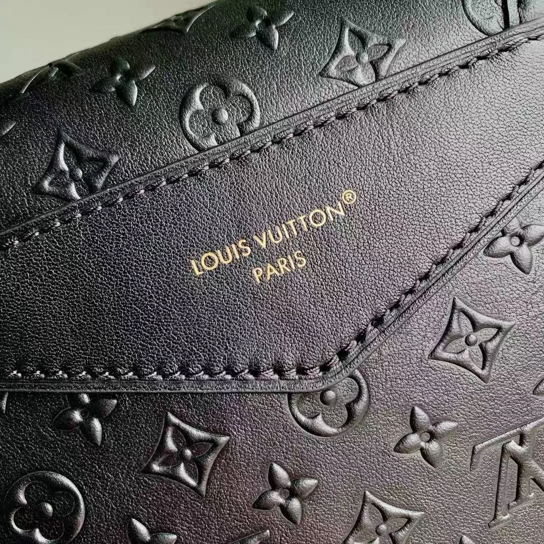 M25554 Odyssée Monogram Handbag