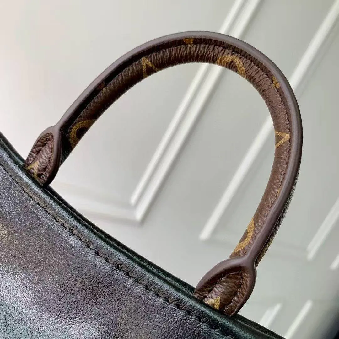 M25522 Off Duty Backpack Vibe Handbag Lamb Leather