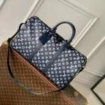 M24953 Keepall Bandoulière 50 Monogram Shadow Embossed Calf Leather Travel Bag - M12504 2 M24953 Keepall Bandoulière 50 Monogram Shadow Embossed Calf Leather Travel Bag