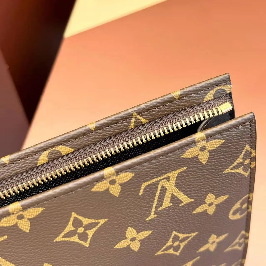 M46037 Poche Toilette NM Monogram Coated Canvas