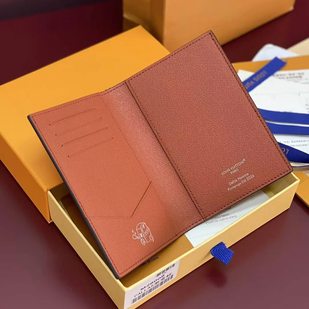 M28009 Passport Cover Orange Monogram Pigment Coated Canvas