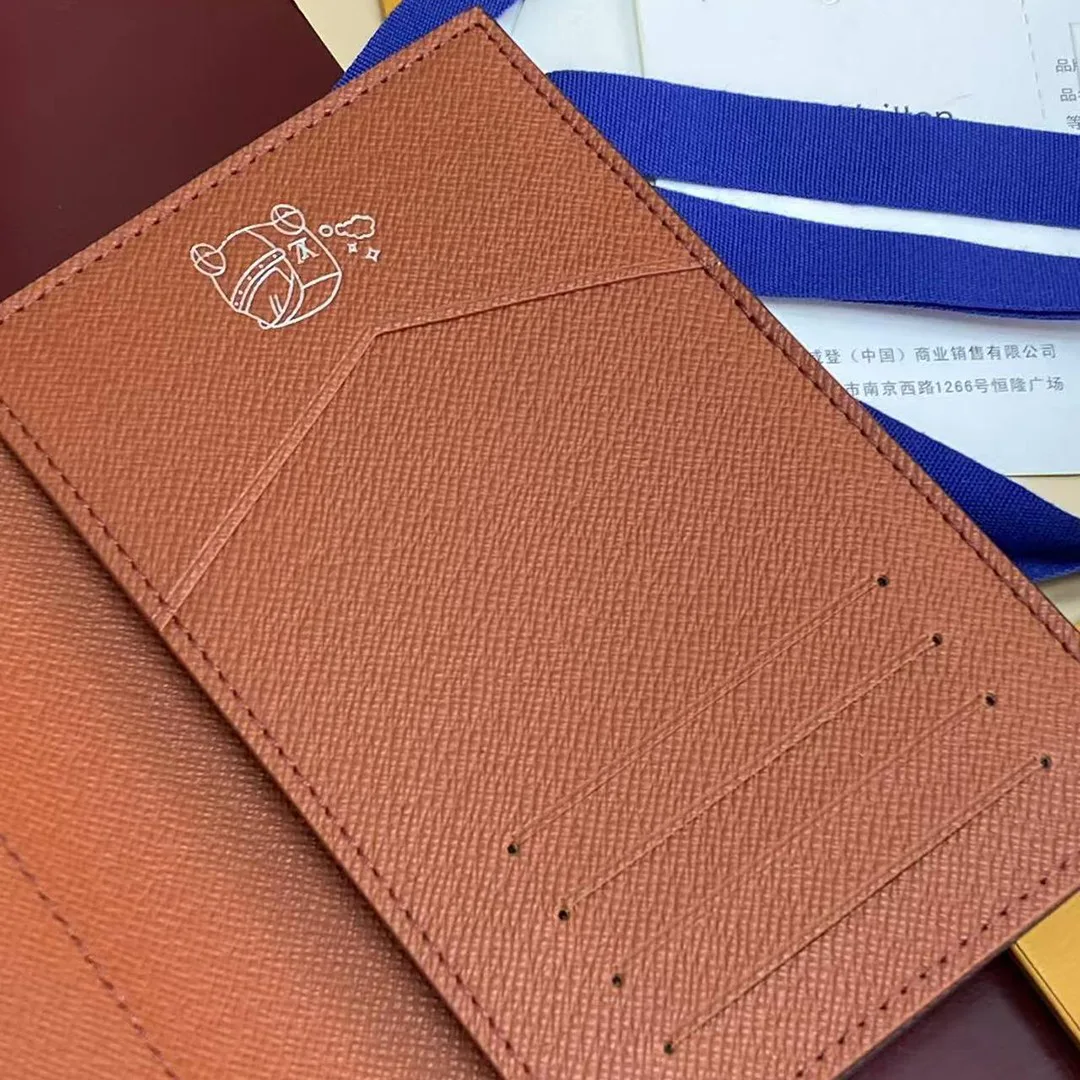 M28009 Passport Cover Orange Monogram Pigment Coated Canvas