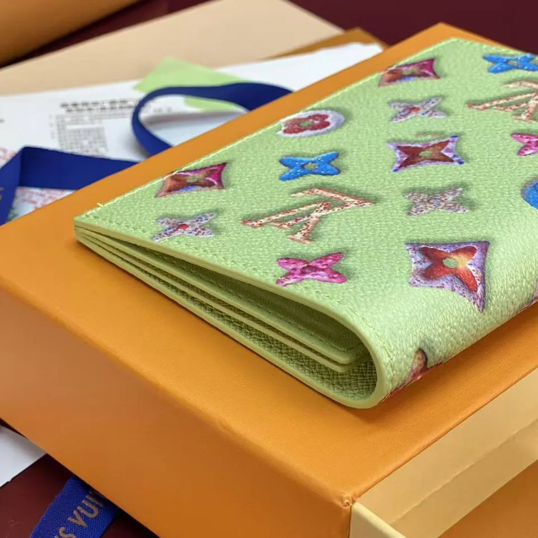 M28039 Passport Cover Pistachio Monogram Donuts Coated Canvas