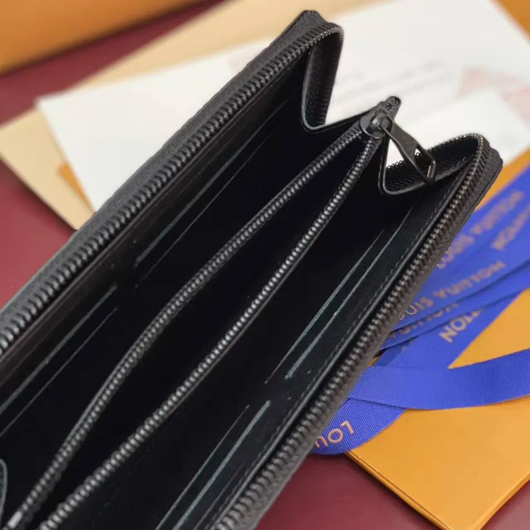 M11721 Zippy Wallet Horizontal Monogram Taurillon Leather