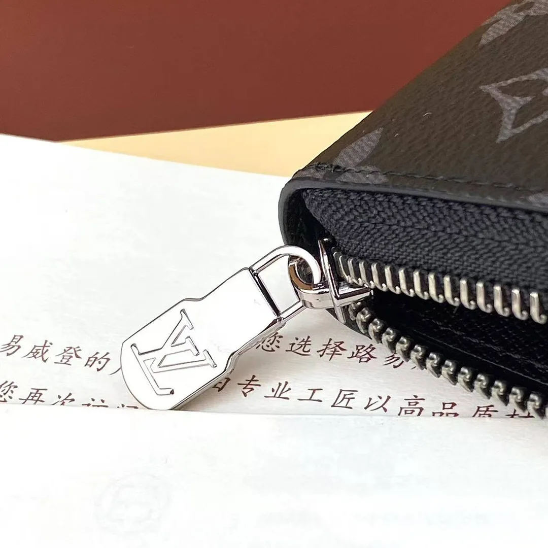 M11611 Zippy Wallet Horizontal Monogram Eclipse Coated Canvas