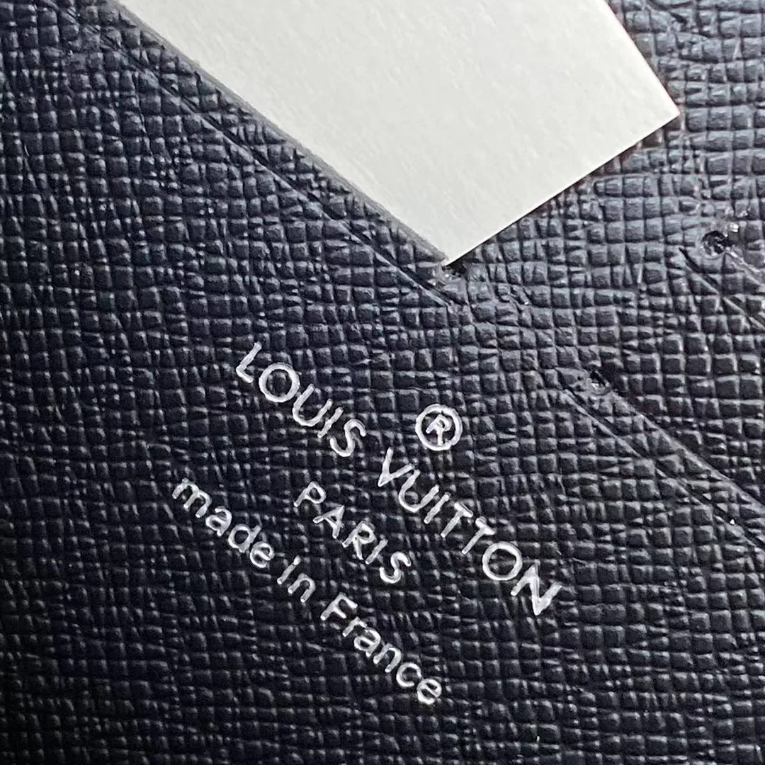 M11611 Zippy Wallet Horizontal Monogram Eclipse Coated Canvas