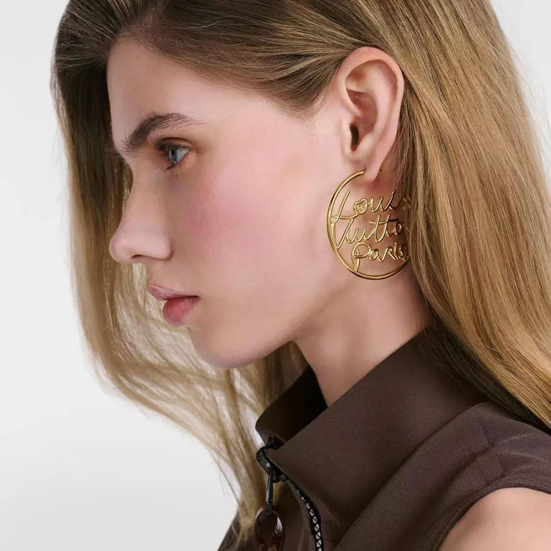 M03239 Script Earrings