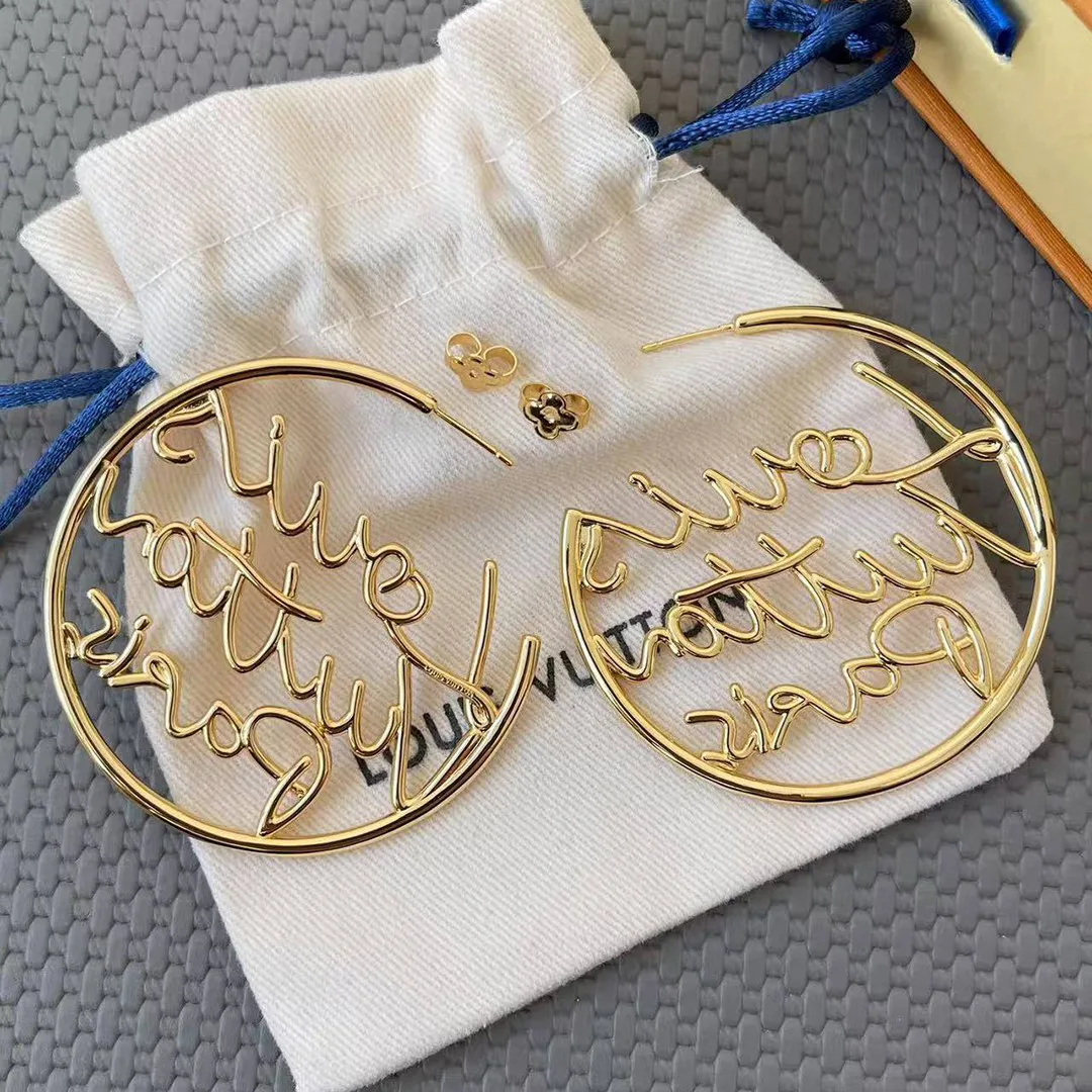 M03239 Script Earrings