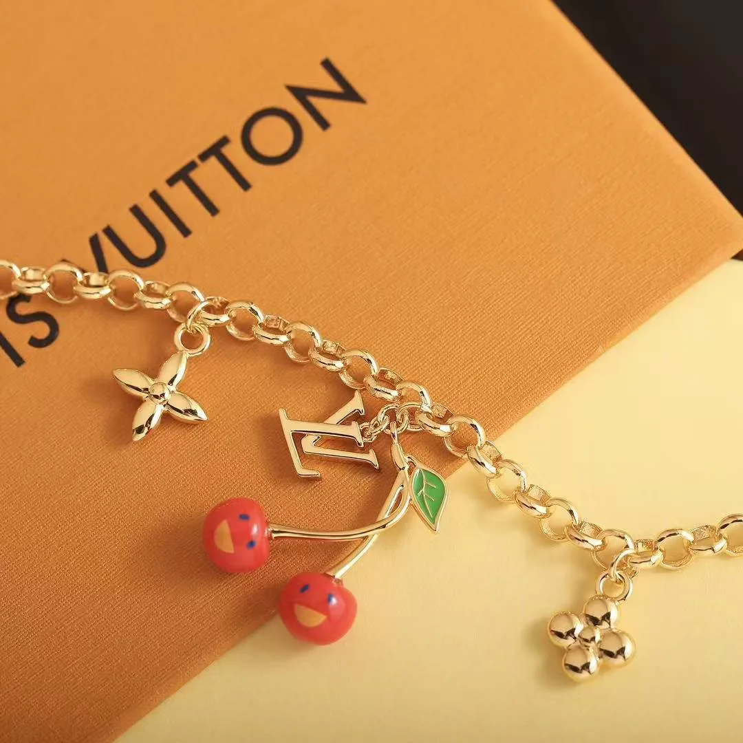 M1691A TM Cerise Bracelet Initials and Monogram Flower Charms