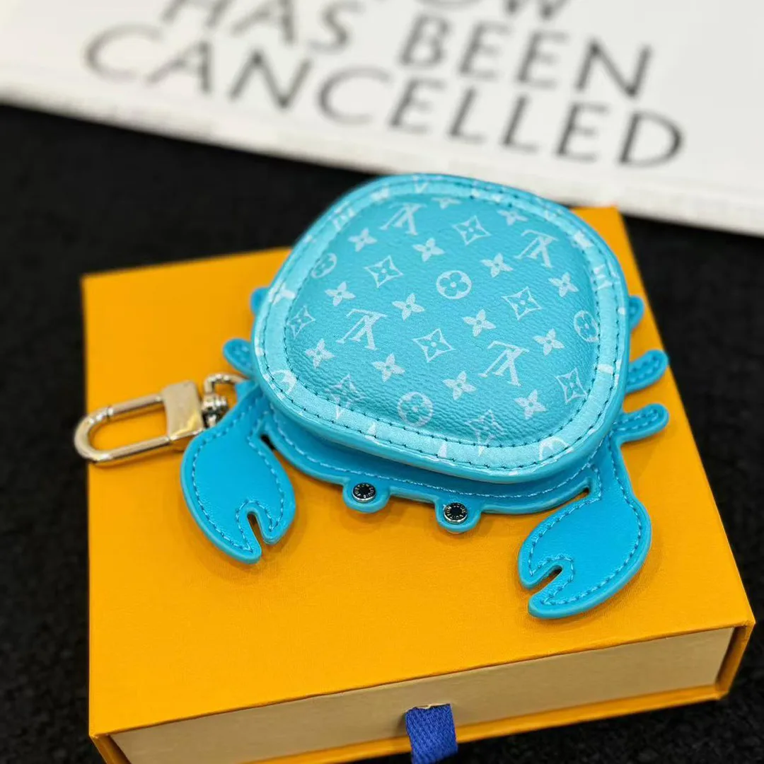 M01930 L.V Crab Bag Charm Blue Canvas and Leather