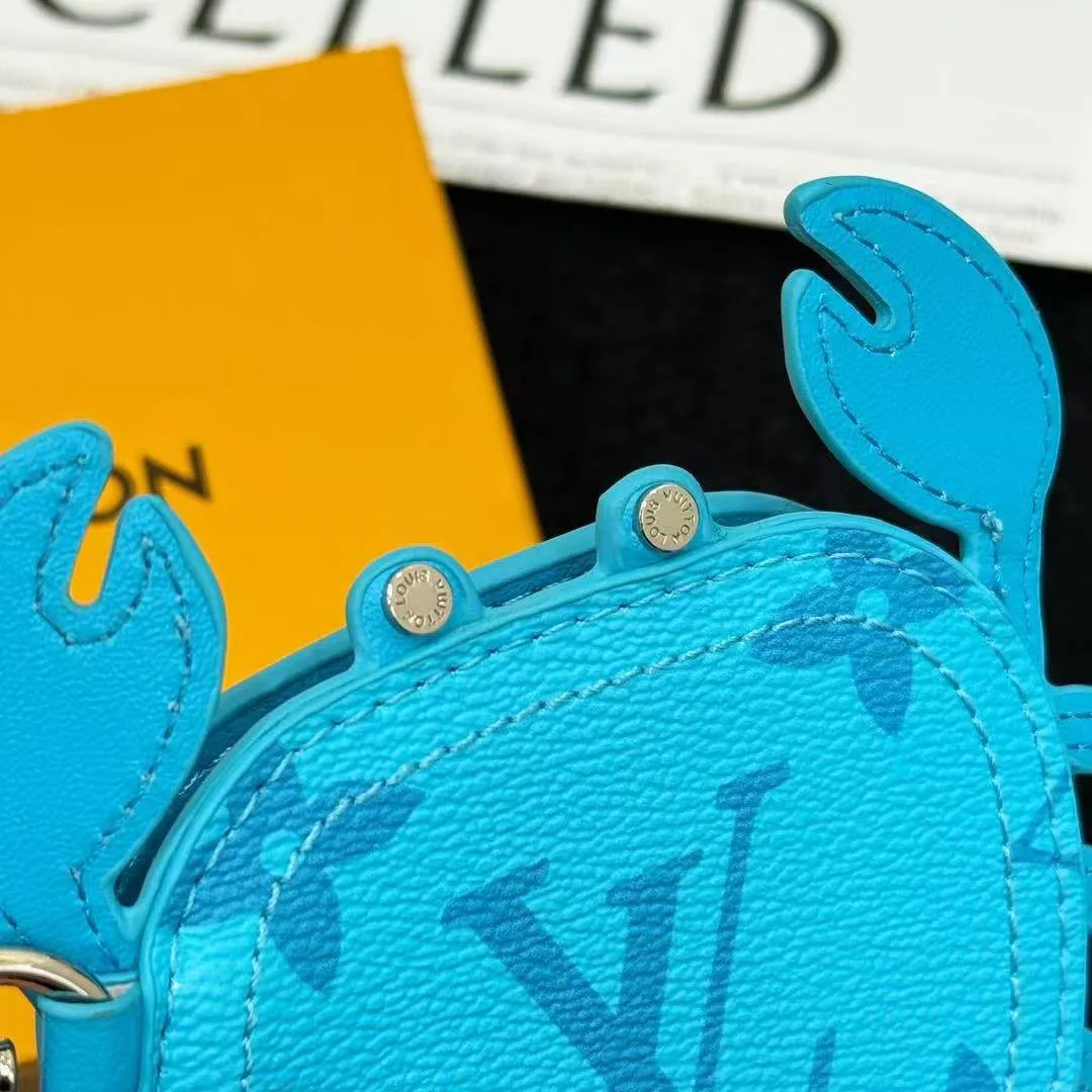 M01930 L.V Crab Bag Charm Blue Canvas and Leather