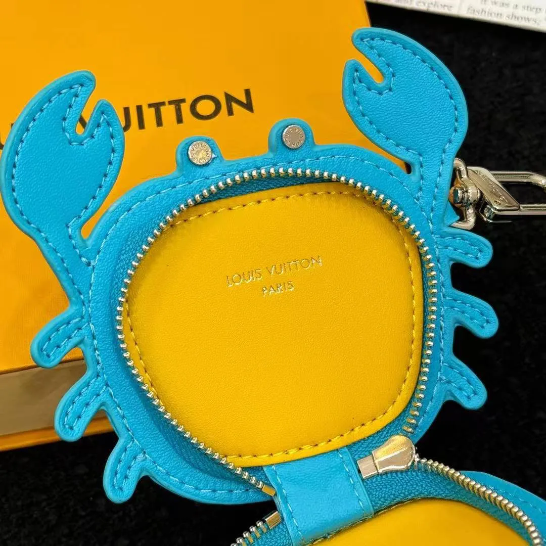 M01930 L.V Crab Bag Charm Blue Canvas and Leather