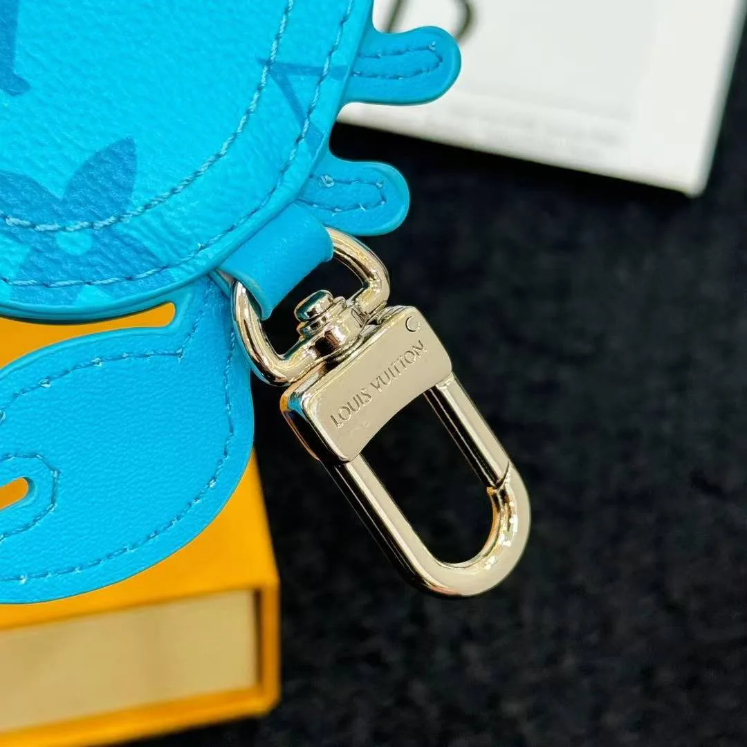 M01930 L.V Crab Bag Charm Blue Canvas and Leather