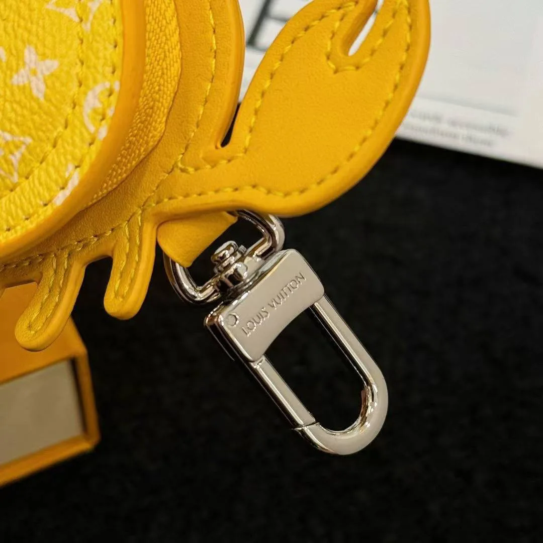 M01932 L.V Crab Bag Charm Yellow Canvas and Leather
