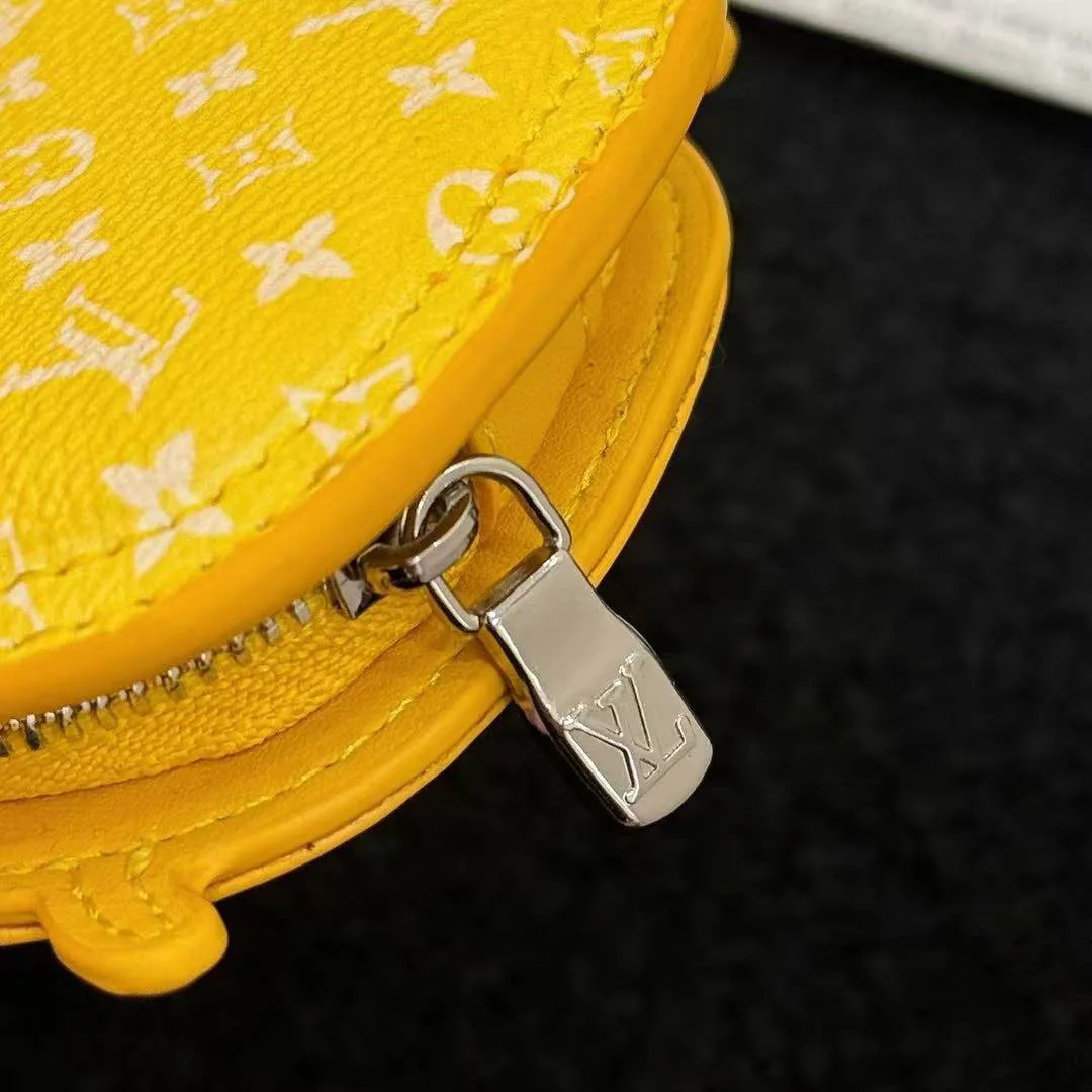 M01932 L.V Crab Bag Charm Yellow Canvas and Leather