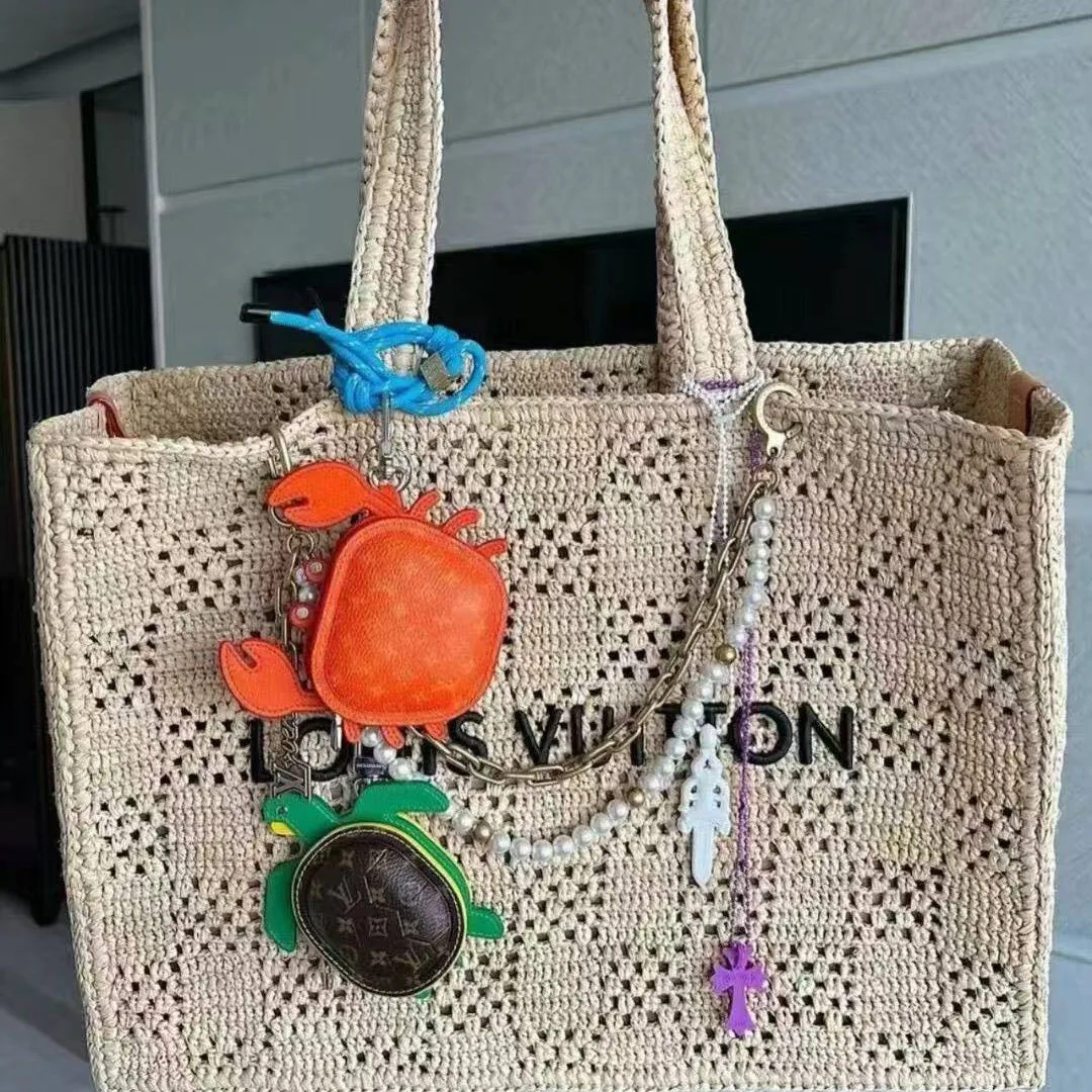 M01929 L.V Crab Bag Charm Orange Canvas and Leather