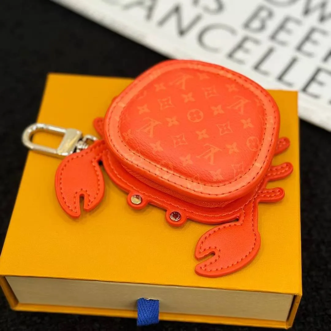 M01929 L.V Crab Bag Charm Orange Canvas and Leather