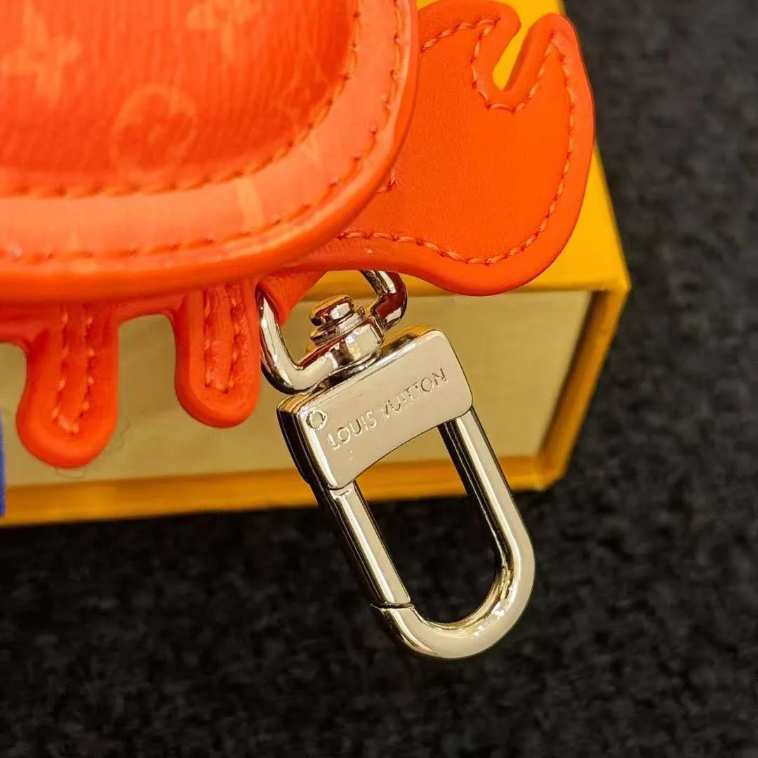 M01929 L.V Crab Bag Charm Orange Canvas and Leather