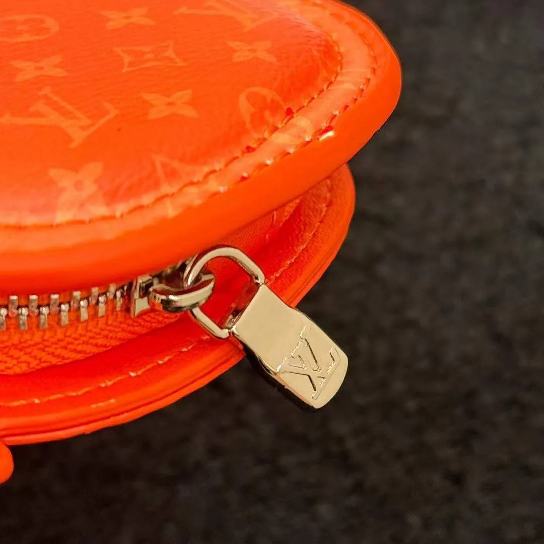 M01929 L.V Crab Bag Charm Orange Canvas and Leather