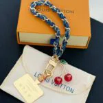 M02623 L.V x TM Denim Cerise Phone Holder Denim Blue Cherries Charm - M03465 1 M02623 L.V x TM Denim Cerise Phone Holder Denim Blue Cherries Charm