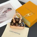 M02796 Micro Alma Bag Charm Monogram PVC - M02599 1 M02796 Micro Alma Bag Charm Monogram PVC