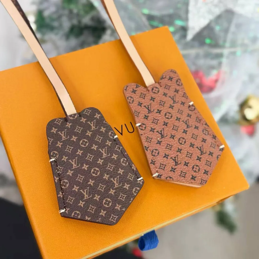 M02342 Cat Bag Charm Monogram Coated Canvas