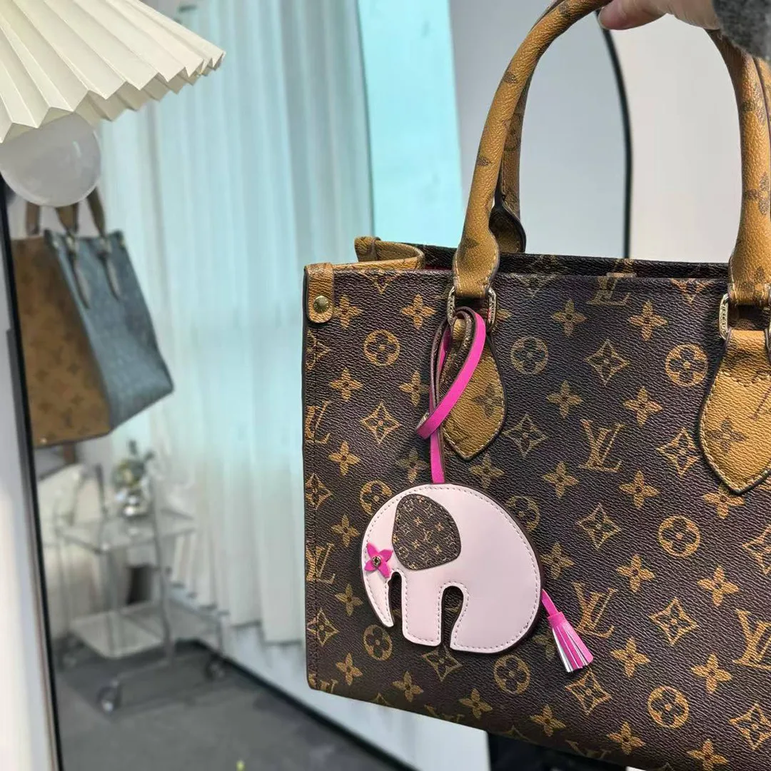 M02383 Elephant Bag Charm Monogram Coated Canvas and Calf Leather