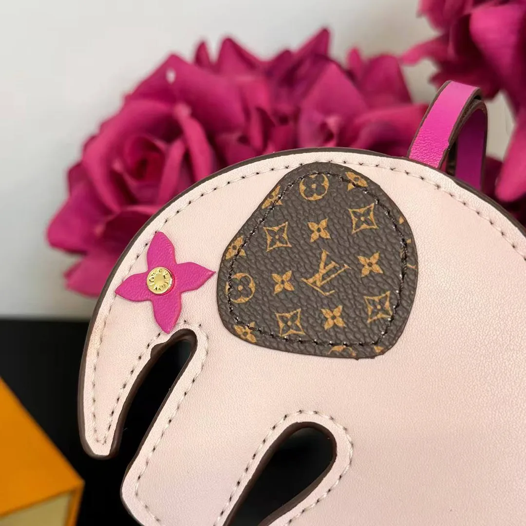 M02383 Elephant Bag Charm Monogram Coated Canvas and Calf Leather
