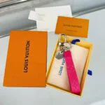 M03440 Slim Dragonne Key Holder and Bag Charm Monogram Heritage Print Canvas - M01701 2 M03440 Slim Dragonne Key Holder and Bag Charm Monogram Heritage Print Canvas