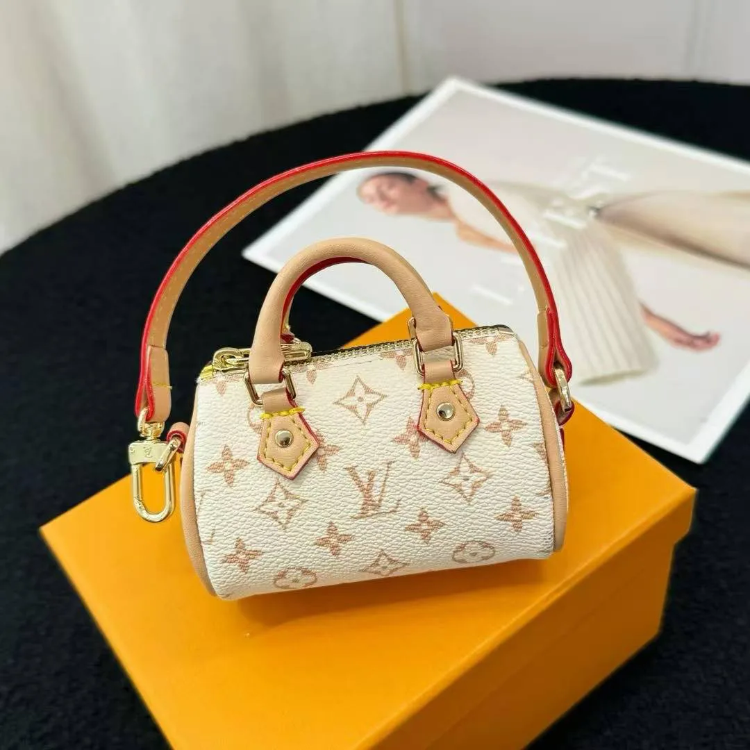 M01882 Micro Speedy Bag Charm Monogram Dune Coated Canvas