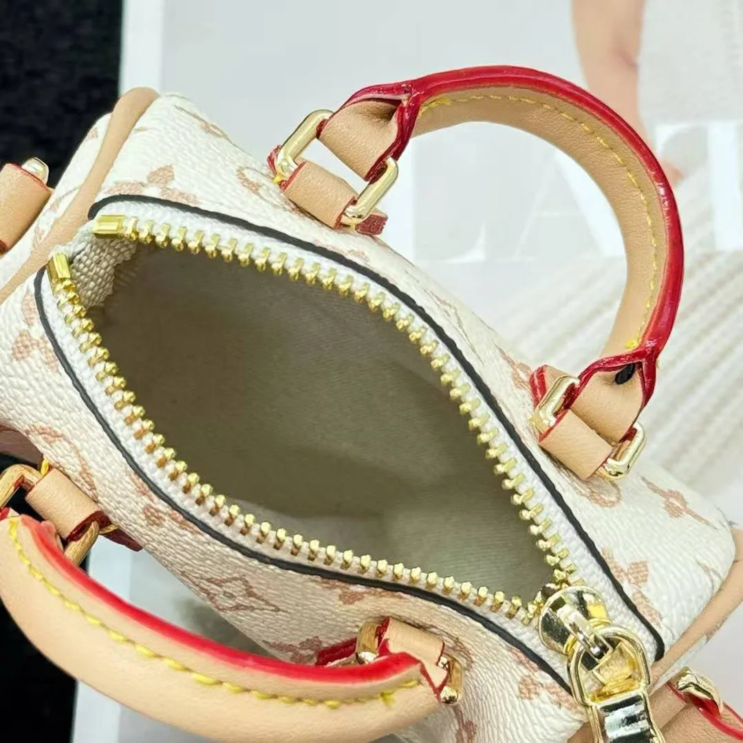 M01882 Micro Speedy Bag Charm Monogram Dune Coated Canvas