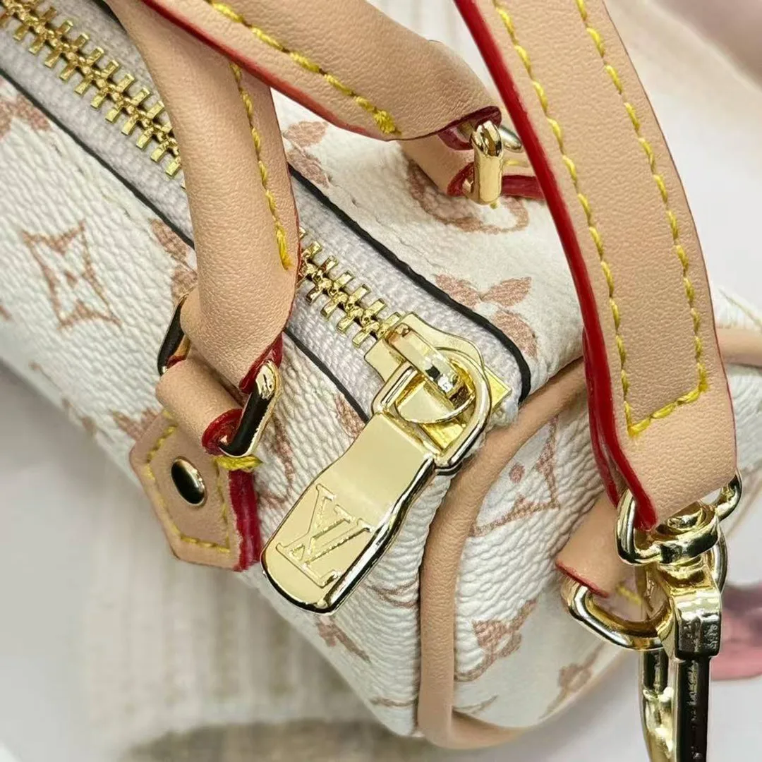 M01882 Micro Speedy Bag Charm Monogram Dune Coated Canvas