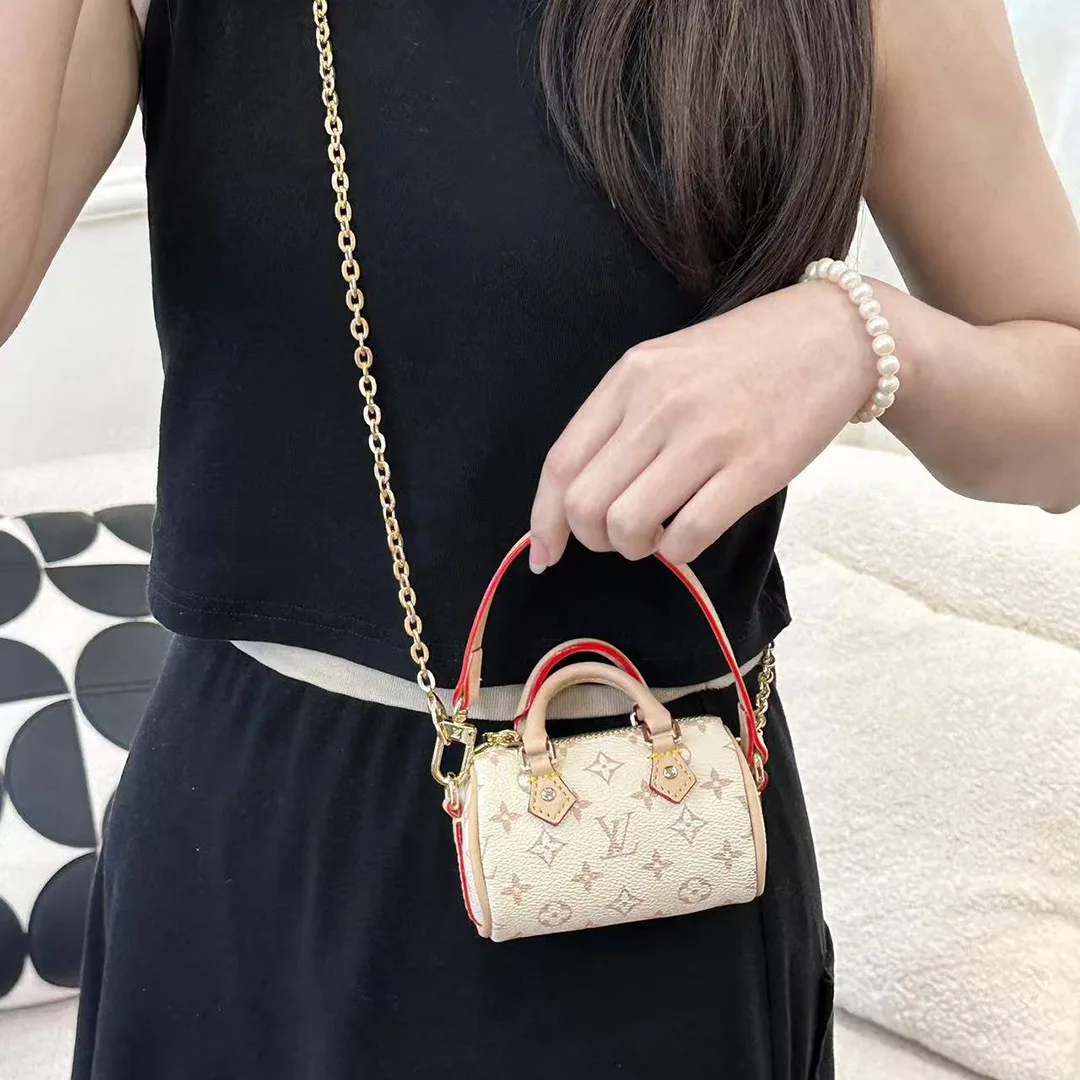 M01882 Micro Speedy Bag Charm Monogram Dune Coated Canvas