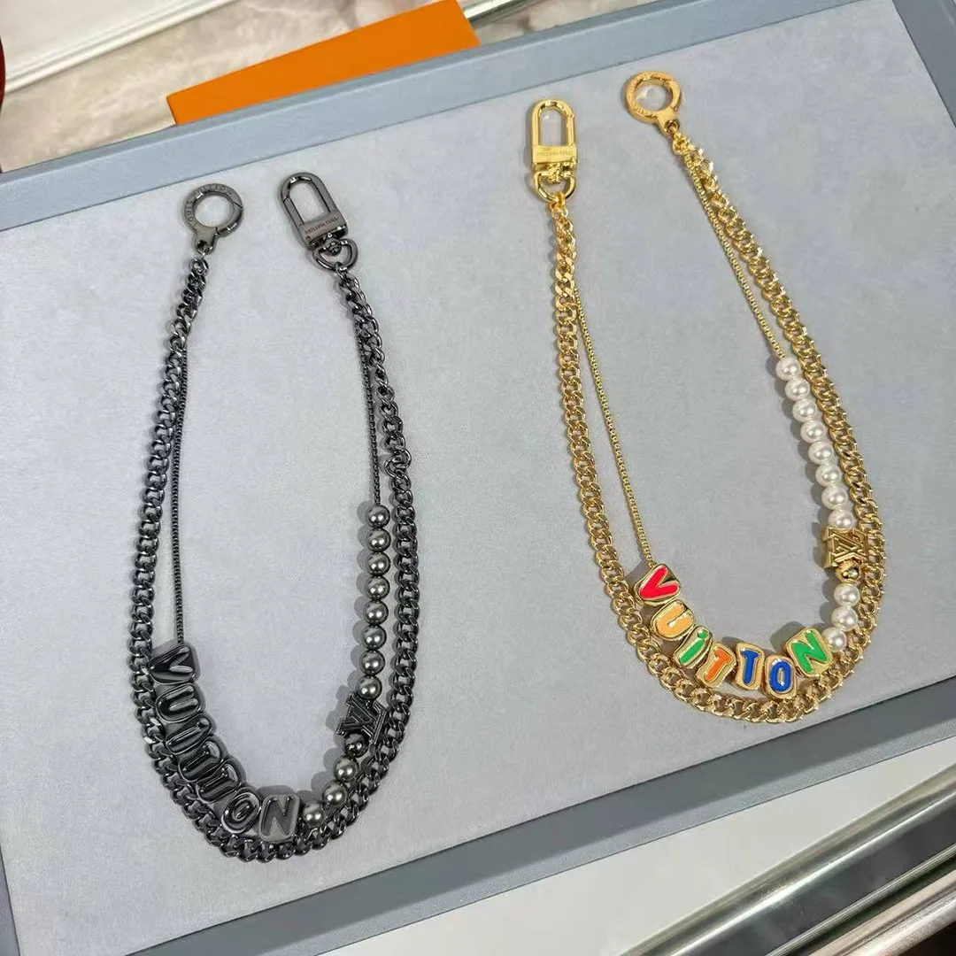 M02434 L.V Chain Belt L.V Signature Charm