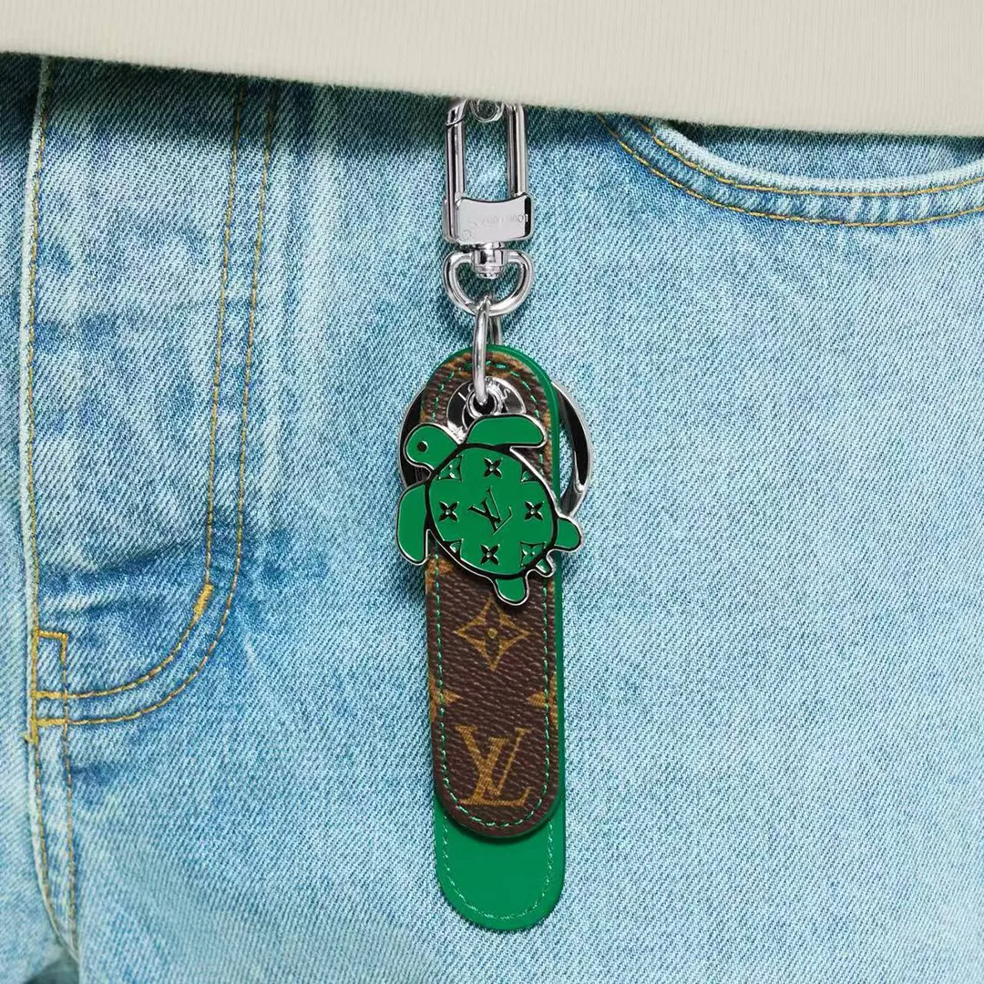 M02564 Dragonne Tab Key Holder and Bag Charm Monogram