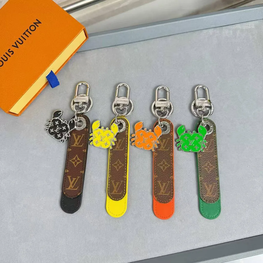 M02558 Dragonne Tab Key Holder and Bag Charm Monogram