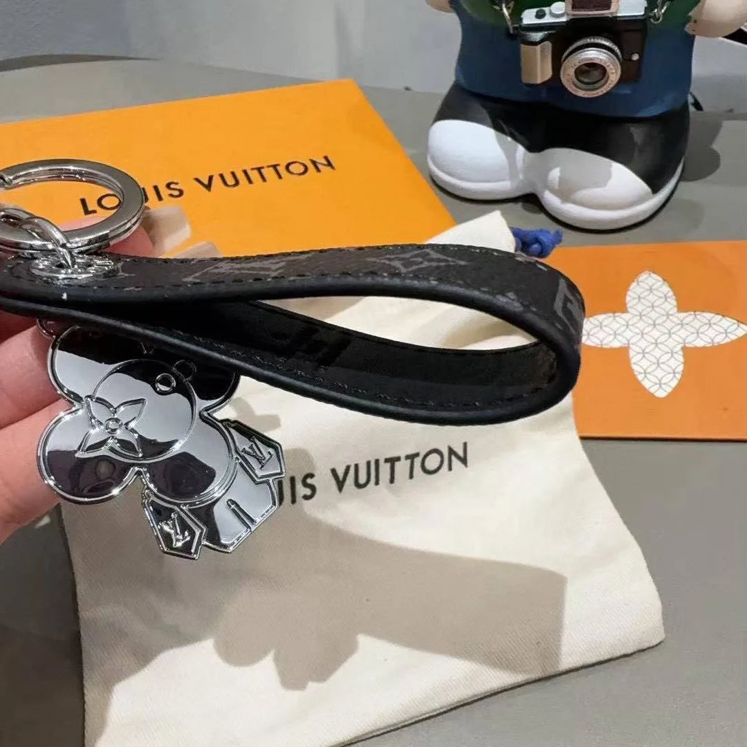 M01821 Vivienne Dragonne Key Holder and Bag Charm Monogram Eclipse Canvas