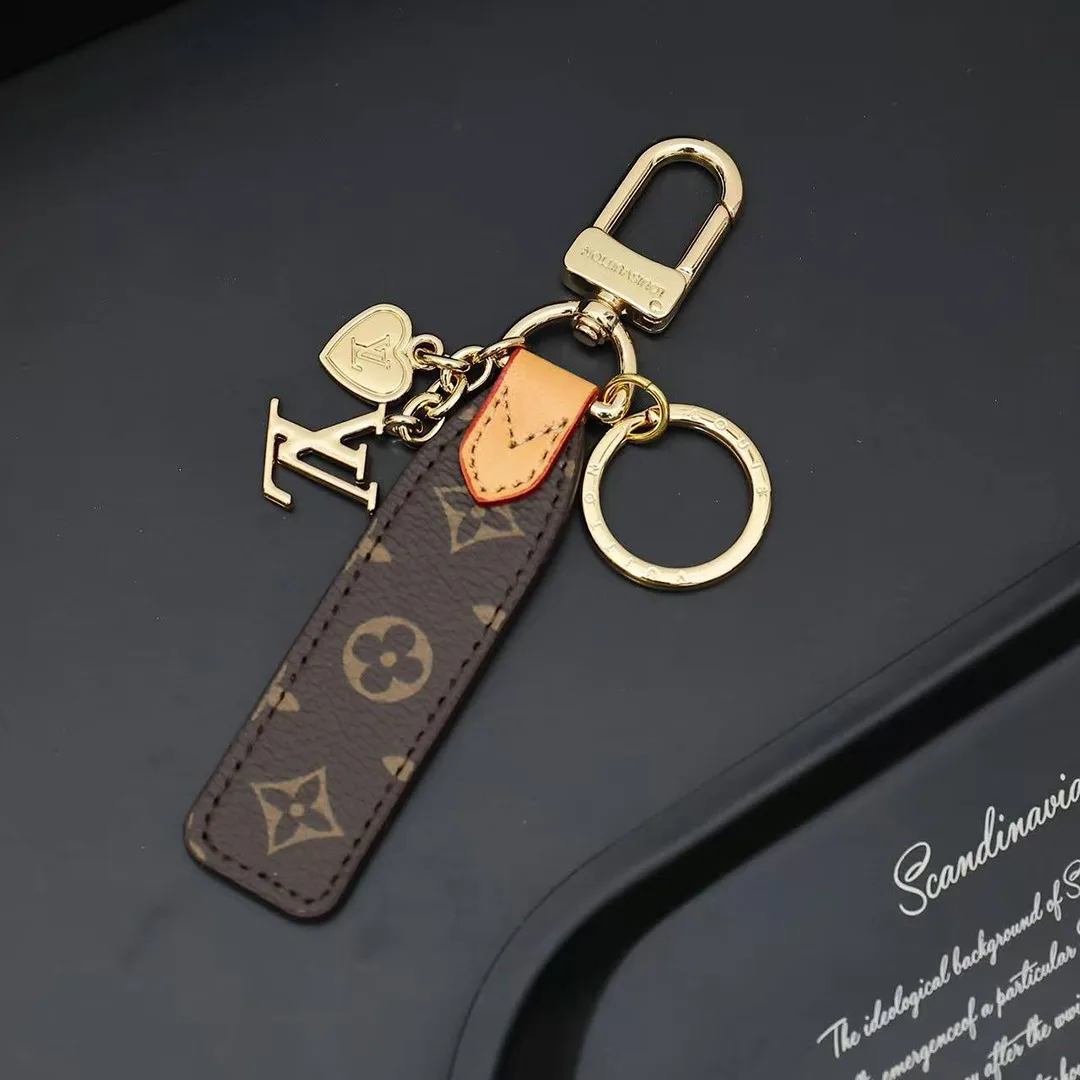 M01184 Cherished Tab Key Holder Monogram Canvas