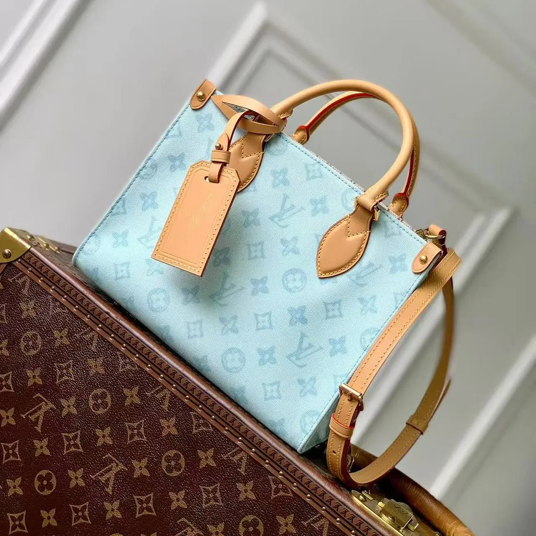 M28289 OnTheGo PM Monogram Origine Bleu Courrier