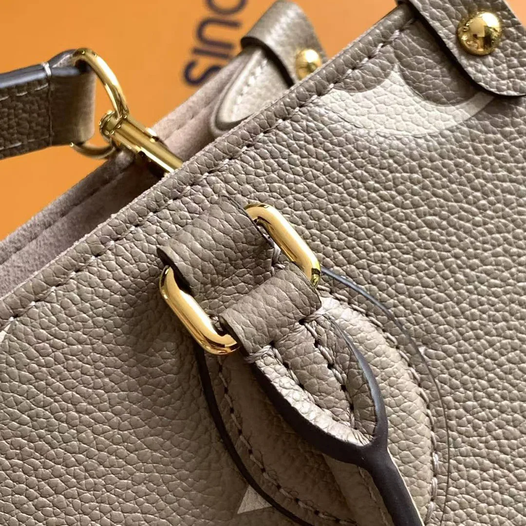 M45779 OnTheGo PM Bicolor Monogram Empreinte Leather