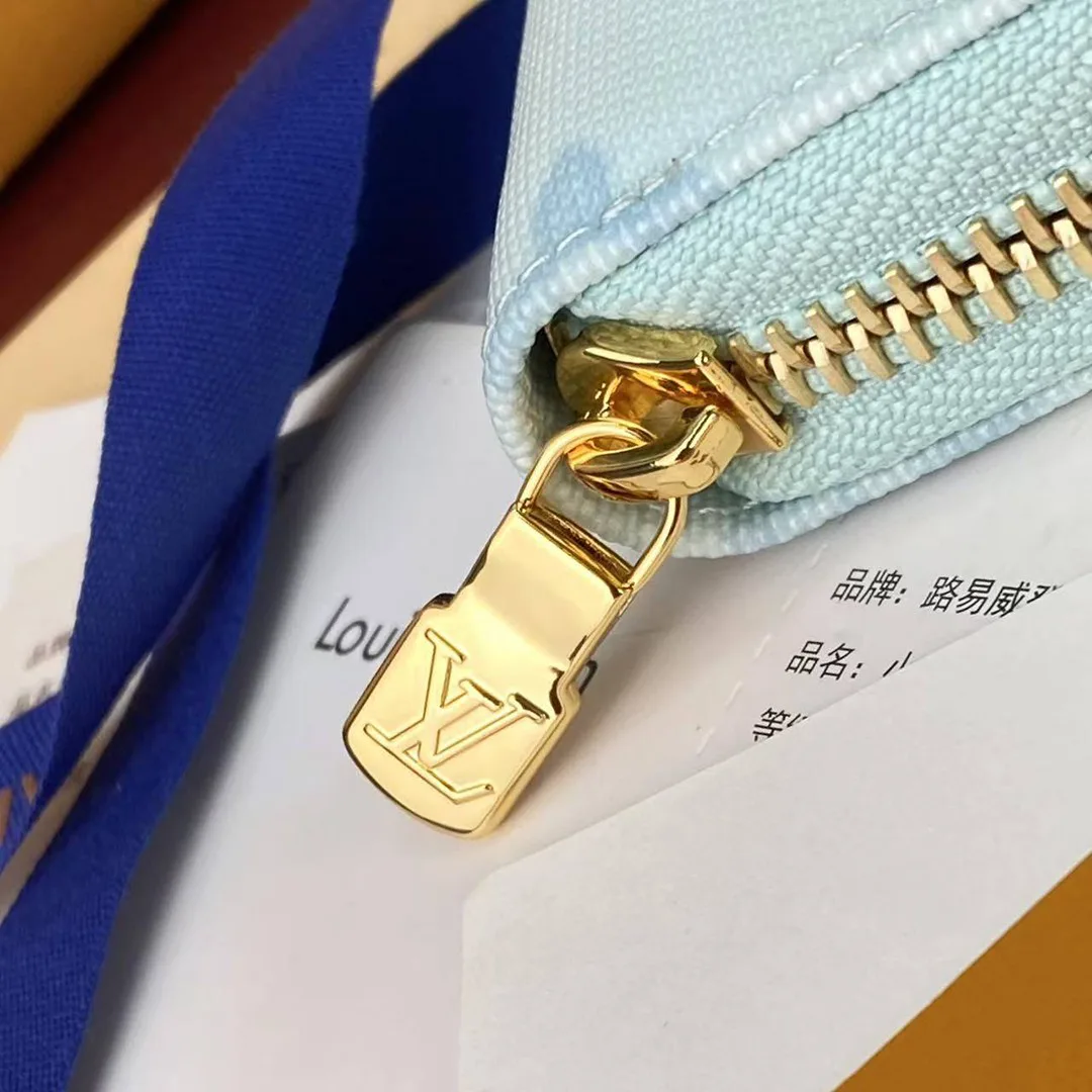 M27686 Zippy Wallet Monogram Origine Bleu Courrier Coated Canvas