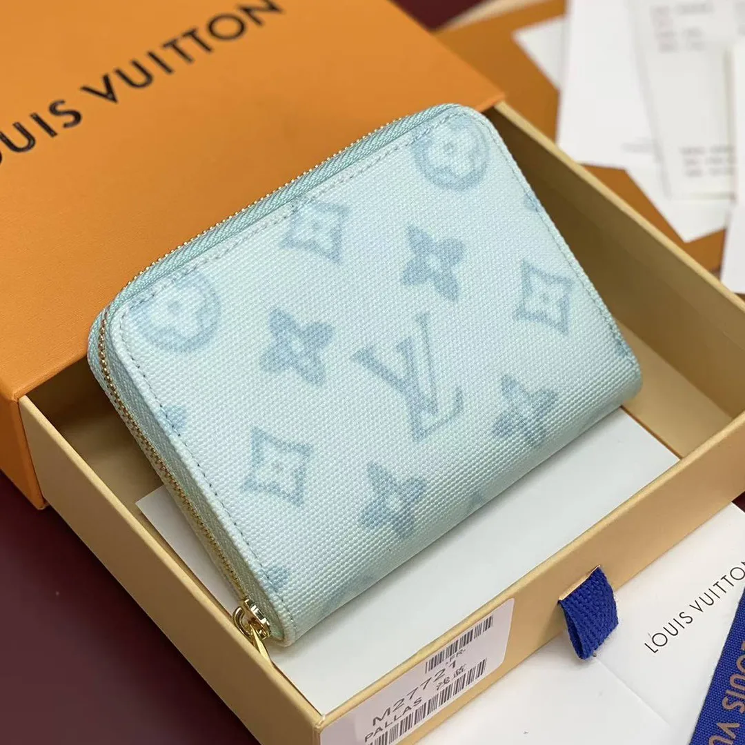 M27721 Zippy Coin Purse Monogram Origine Bleu Courrier Coated Canvas