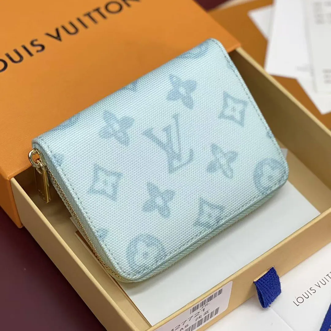 M27721 Zippy Coin Purse Monogram Origine Bleu Courrier Coated Canvas