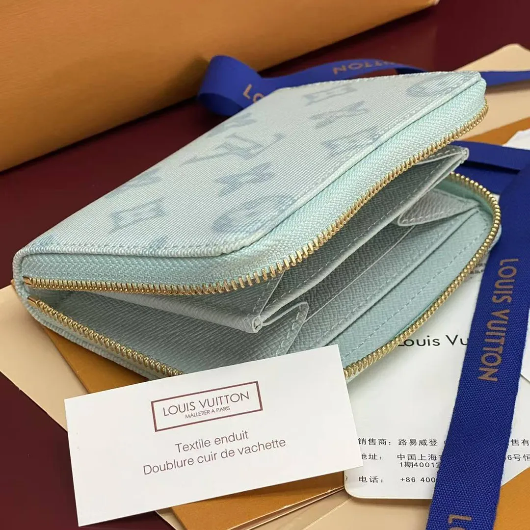 M27721 Zippy Coin Purse Monogram Origine Bleu Courrier Coated Canvas